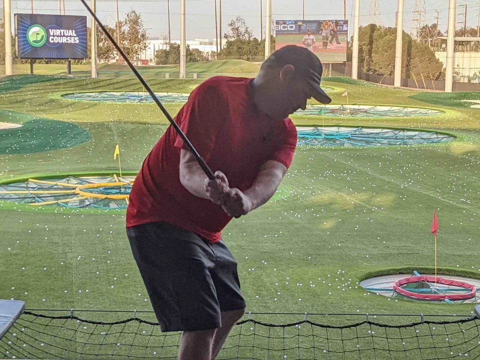 Man about to hit tee at Top Golf in El Segundo, Sep 2022.